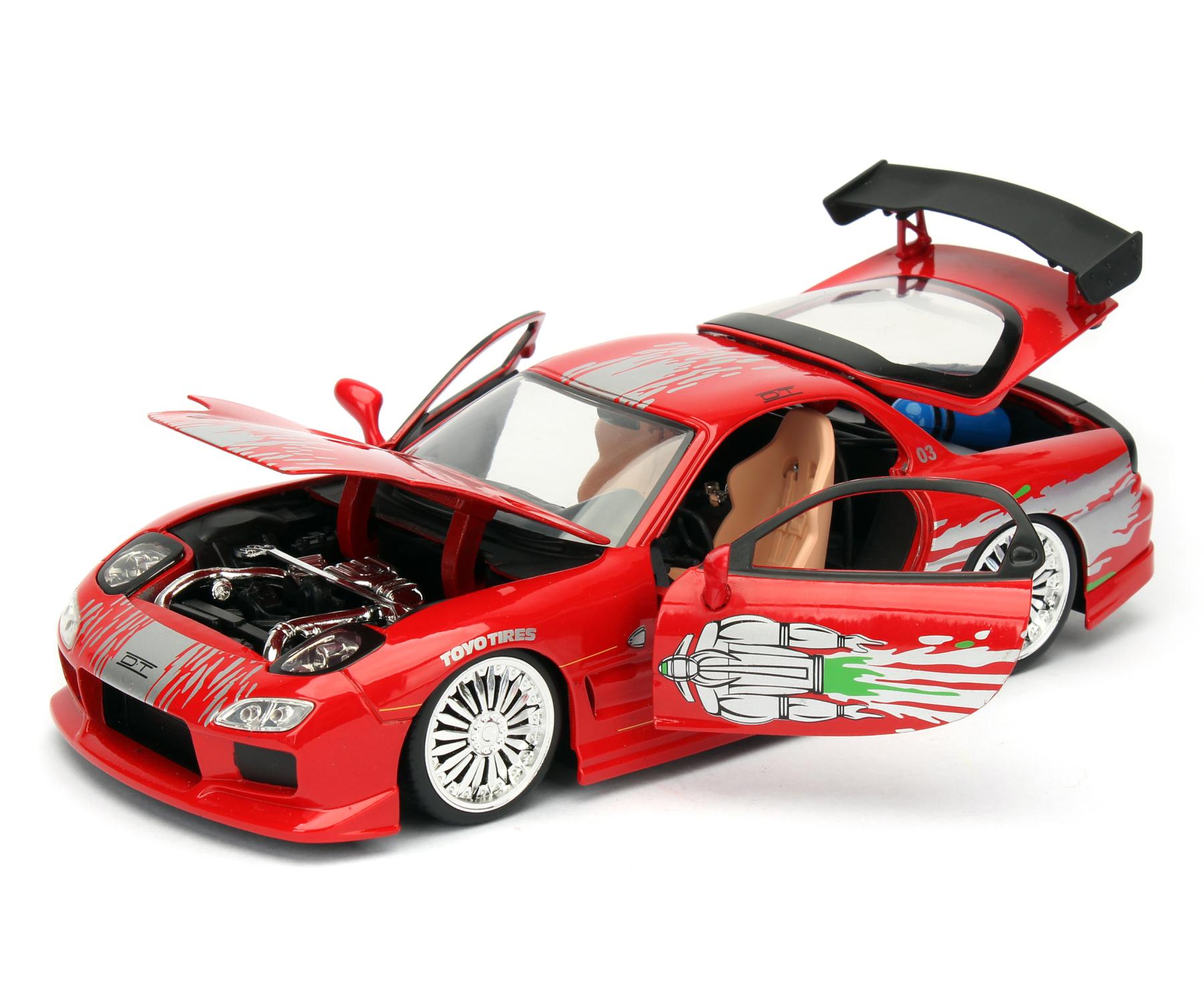 Jada 253203004 Toys Fast & Furious Brian's 1971 Nissan Skyline GT-R 2000 (C10), voiture, modèle tuning à l'échelle 1:24, avec spoiler, portes ouvertes, capot et coffre, roue libre Noir Jada 253203004 Toys Fast & Furious Brian's 1971 Nissan Skyline GT-R 2000 (C10), voiture, modèle tuning à l'échelle 1:24, avec spoiler, portes ouvertes, capot et coffre, roue libre Noir
